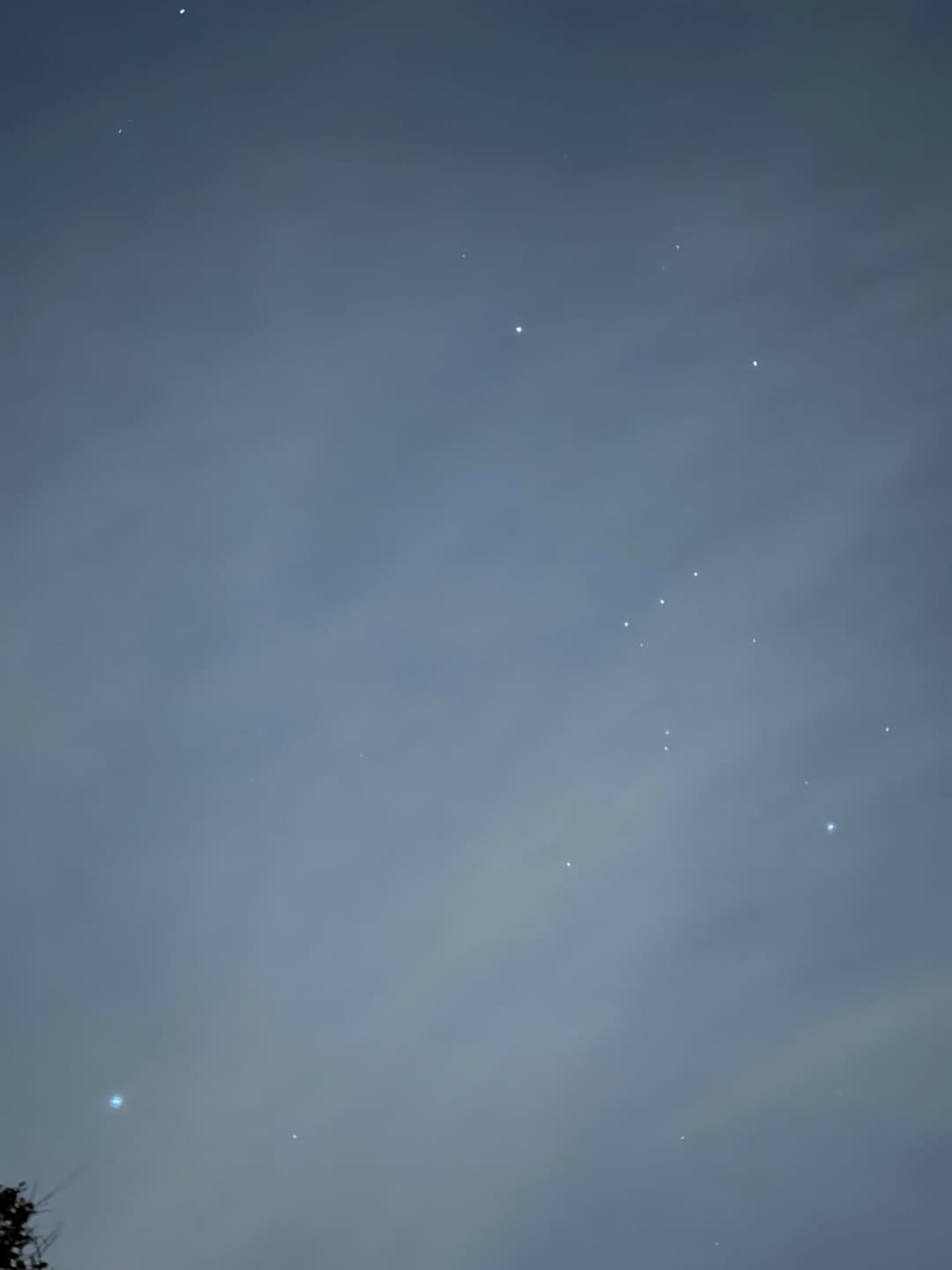 Orion with high clouds and massive light pollution